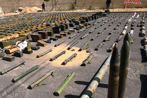 armas halladas en escondites terroristas en el sur de Siria Hallan enormes cantidades de armas en escondites terroristas en el sur de Siria
